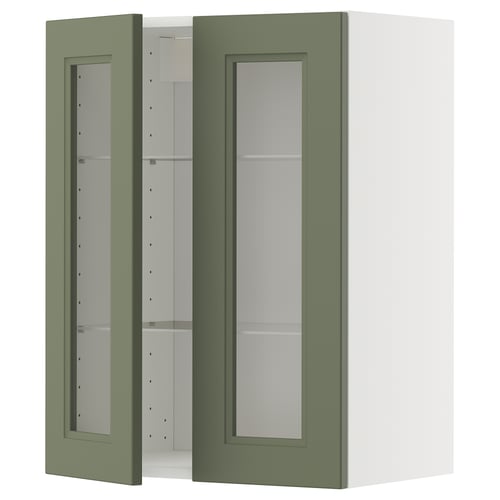 Green kitchen cabinet with glass door & shelves.