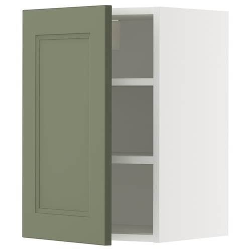 Displays an open, greenish-gray METOD kitchen wall cabinet with an adjustable shelf.