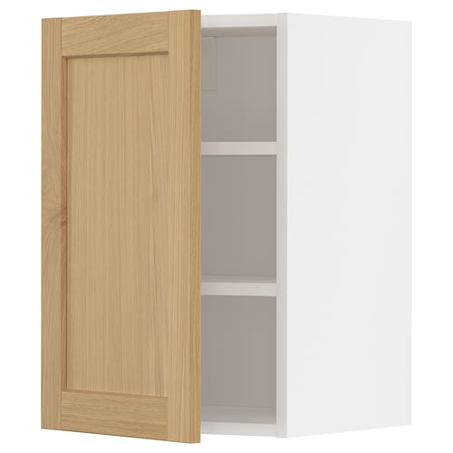METOD kitchen cabinet: light wood door, white interior, minimalist design.