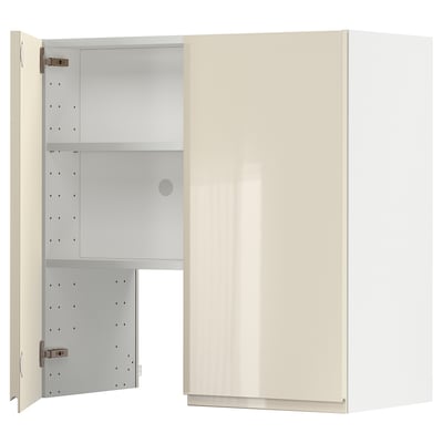 A cream-colored, high-gloss METOD kitchen cabinet with an adjustable shelf and a door mounted on the left side.