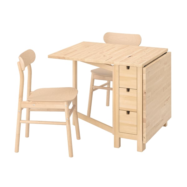A light wood-colored NORDEN dining set featuring a foldable table and two matching chairs, designed for compact spaces.