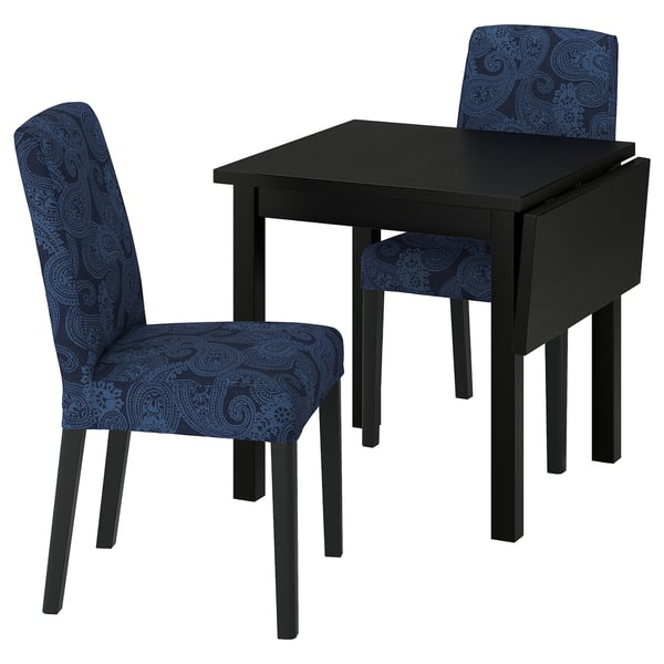 Modern black square dining set with blue paisley chairs.