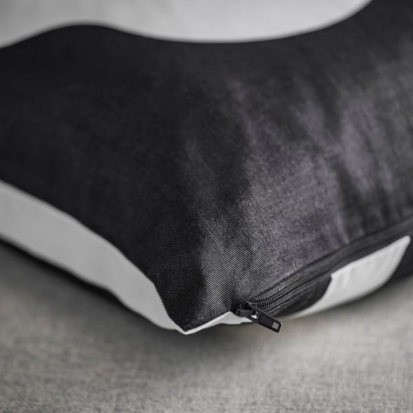 Black and white cushion cover with zip, showcasing premium quality fabric and craftsmanship.