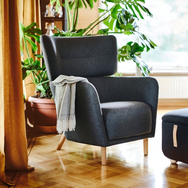OSKARSHAMN Wing chair with footstool, Gunnared black/grey