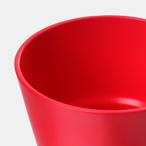 Bright red, smooth, high-quality pottery planter with glossy finish and sturdy construction for plants.