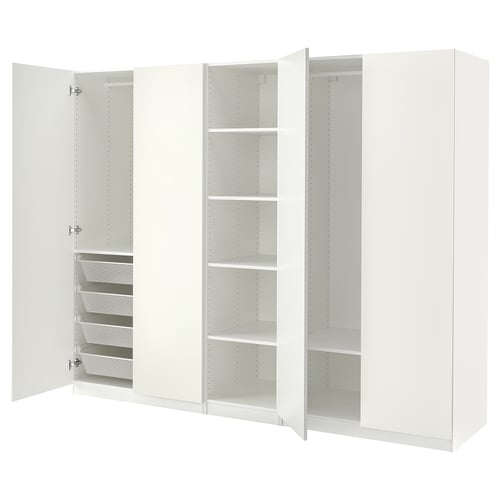 A white ikea PAX wardrobe with open doors, revealing shelves and a basket.
