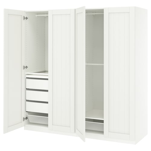 White PAX wardrobe with open doors, shelves, and drawers.