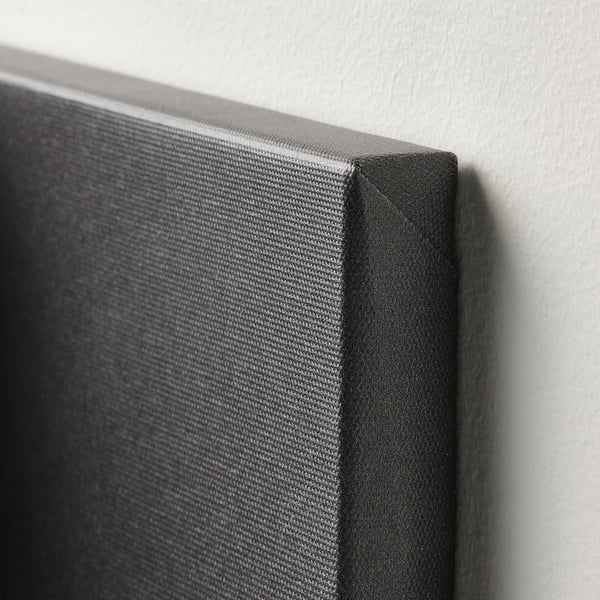 High-quality black canvas art partially wrapped around its frame, showcasing a modern, textured, and seamless edge.