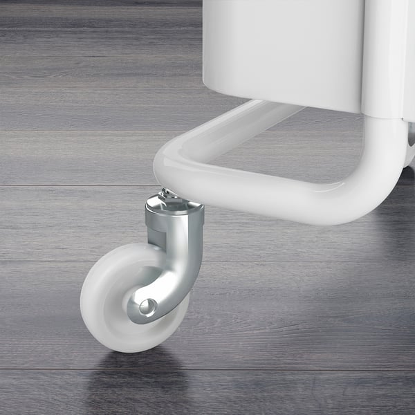 Close-up of a sturdy, white trolley wheel on a wooden floor
