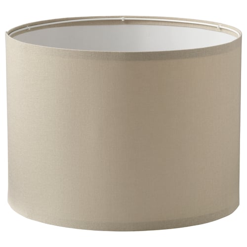 A beige fabric lampshade named RINGSTA. Its cylindrical with minimal design.