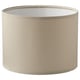 A beige fabric lampshade named RINGSTA. Its cylindrical with minimal design.