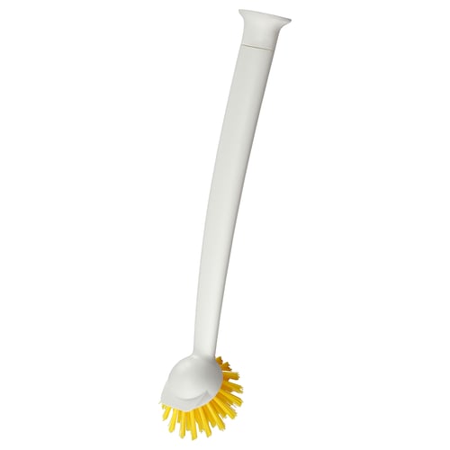 Depicts a white RINNIG scrub brush with a long handle and yellow bristles, designed for cleaning kitchen surfaces.