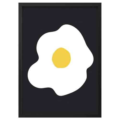 Black square-framed art with central yellow and white circular design.