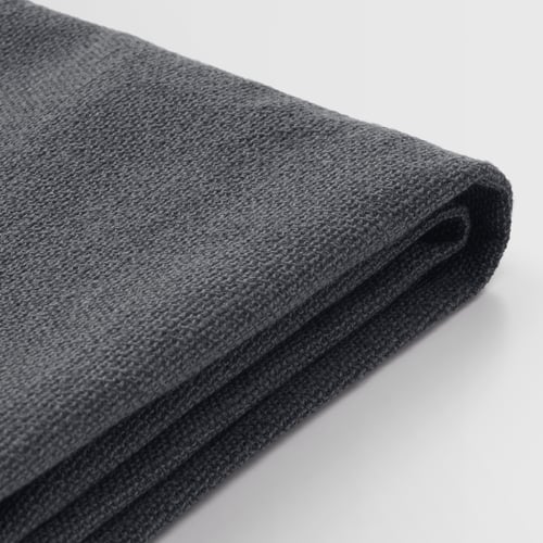 Folded dark grey textile, likely a machine-washable chair cover, displayed against a light background.