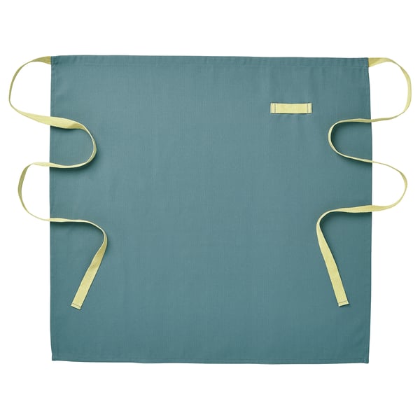 SANDVIVA teal apron with beige ties, rectangular shape, hangs easily.