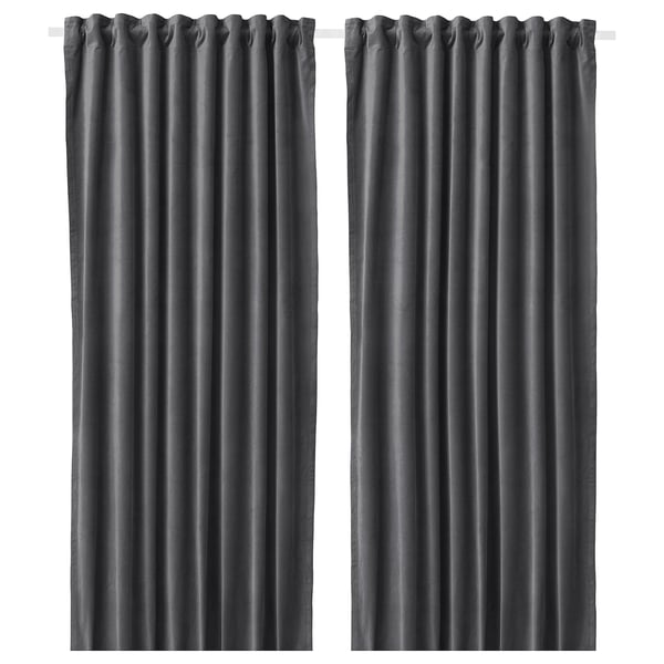 Two dark grey, solid panel curtains, hanging straight with a smooth texture, made of 100% cotton.