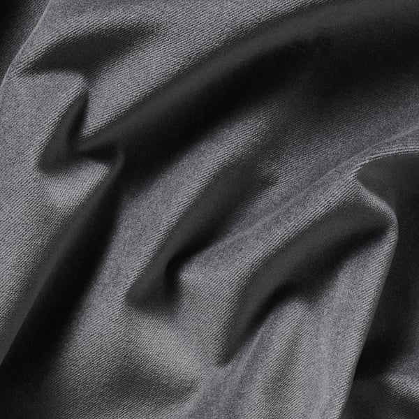 Close-up of luxurious, textured dark grey cotton velvet, soft and elegant, ideal for curtains.