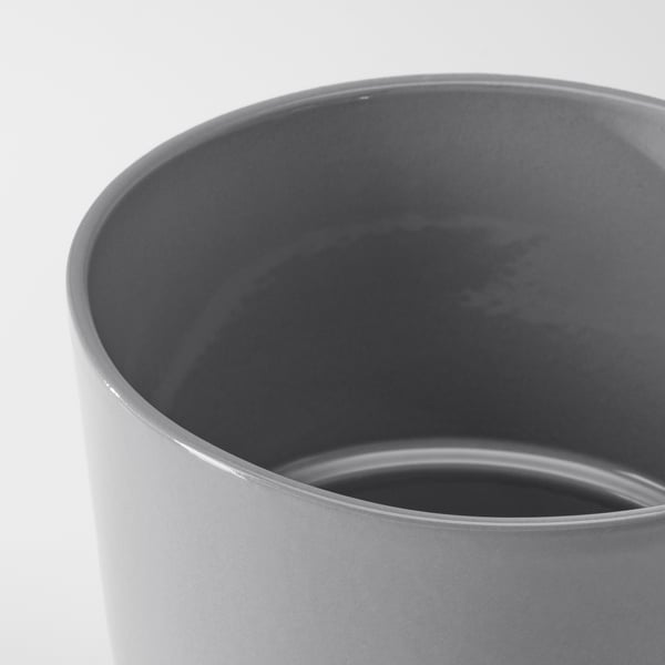 Sleek, modern planter in grey stoneware, smooth finish, simple design, perfect for indoor or outdoor plants.