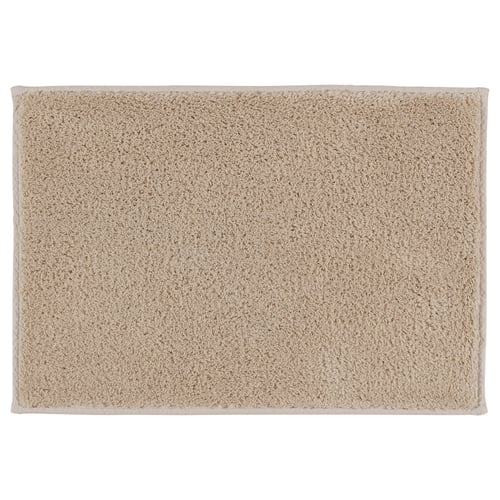 SÖDERSJÖN bath mat, beige. Soft cotton, latex backing, rectangular with textured surface.