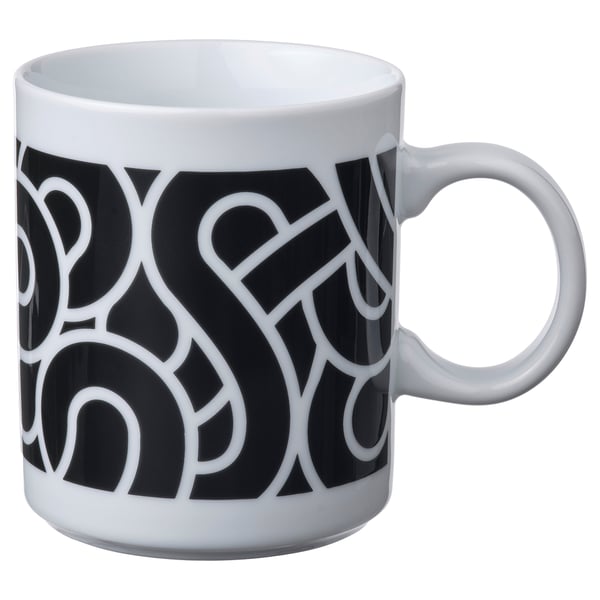 Black and white mug with abstract geometric design. Circular handle, white rim and inside, made of feldspar porcelain.