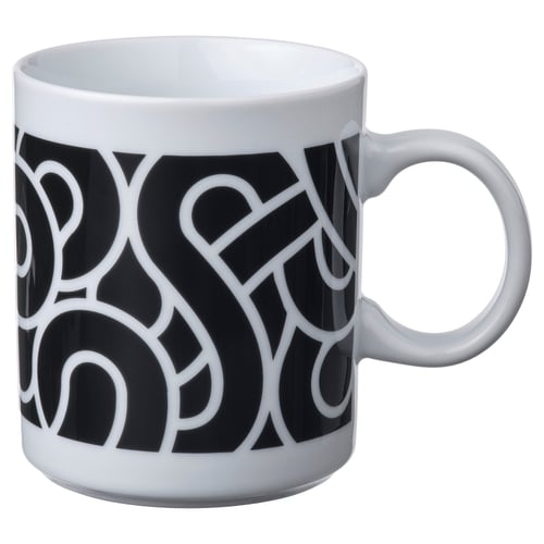 Black and white mug with abstract geometric design. Circular handle, white rim and inside, made of feldspar porcelain.