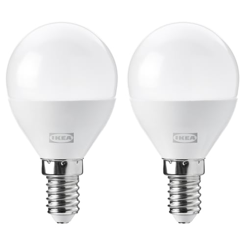 Two ikea led light bulbs, white, spherical shape, e14 base, stand upright, brand visible.