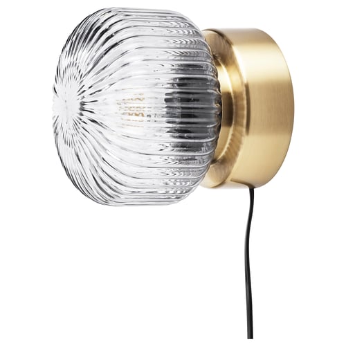 Modern wall lamp SOLKLINT with ribbed glass shade, brass base, soft light, mounts via bracket.