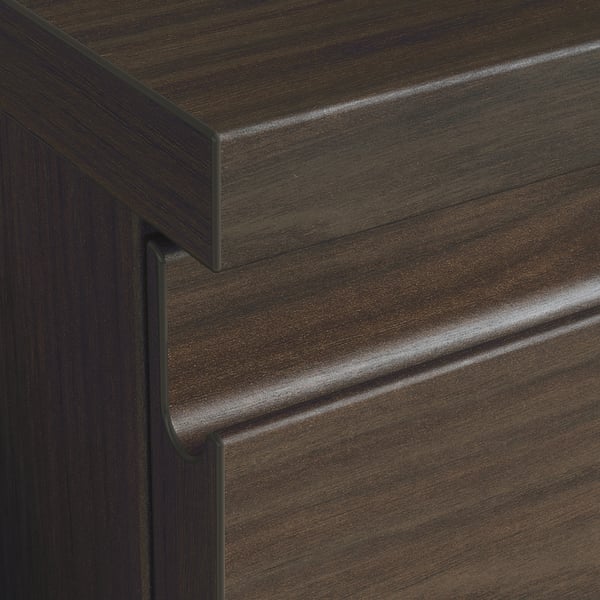 Dark wood grain desk edge detail, showing sleek finish and sturdy construction.