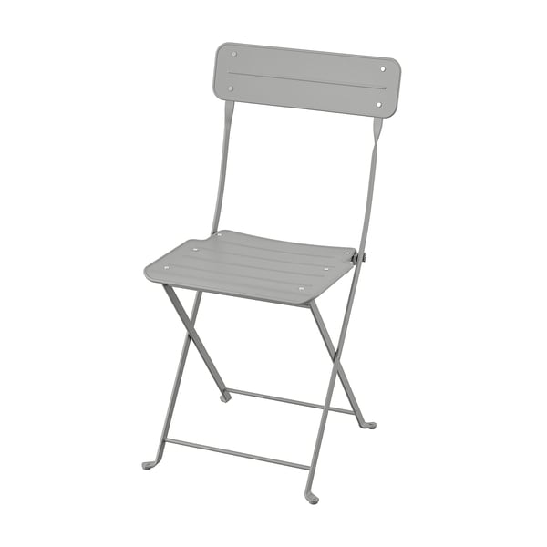 A grey, folded SUNDSÖ chair. Its made of steel with a powder-coated finish. The chair a simple, modern design with a rectangular seat and backrest.