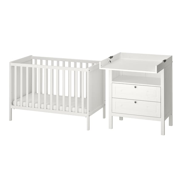 Two-piece white baby furniture set: crib & changing table with drawers, clean design.