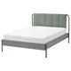 Modern TÄLLÅSEN bed: grey-green, metal, plush headboard, clean lines, white sheet.