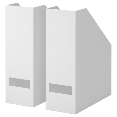 Two white TJENA magazine holders, made from recycled paperboard, stand upright side by side with label slots for organisation.