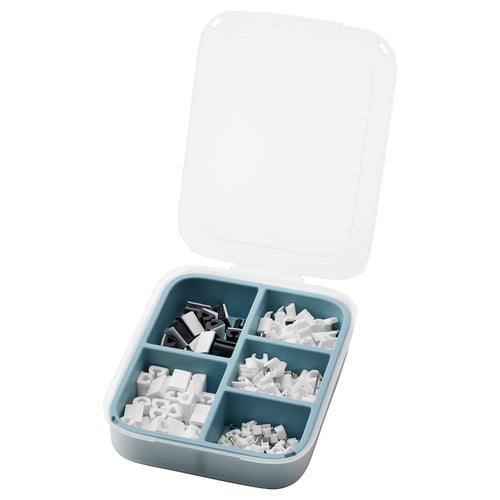 Open blue TRIXIG storage box with multiple compartments filled with small white plastic parts, likely for organising cables.