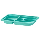 A TROFAST storage tray in turquoise. It has multiple compartments for organising small items, made of recycled polypropylene.
