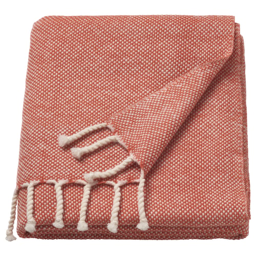 ULLTISTEL red-orange throw, soft wool with fringes, square shape.