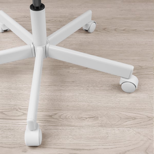 White office chair base with five casters on light wood floor, showcasing sturdy design and mobility.