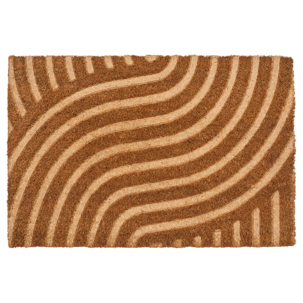 Brown tan coco fibre doormat with wavy pattern.