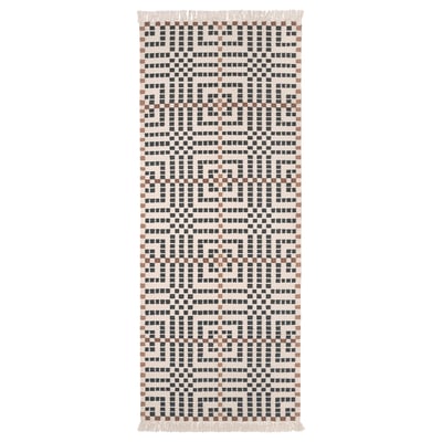 The VAMDRUP rug, handcrafted in white, black, and brown tones, a traditional scandinavian weave pattern, ideal for hallways or bedrooms.