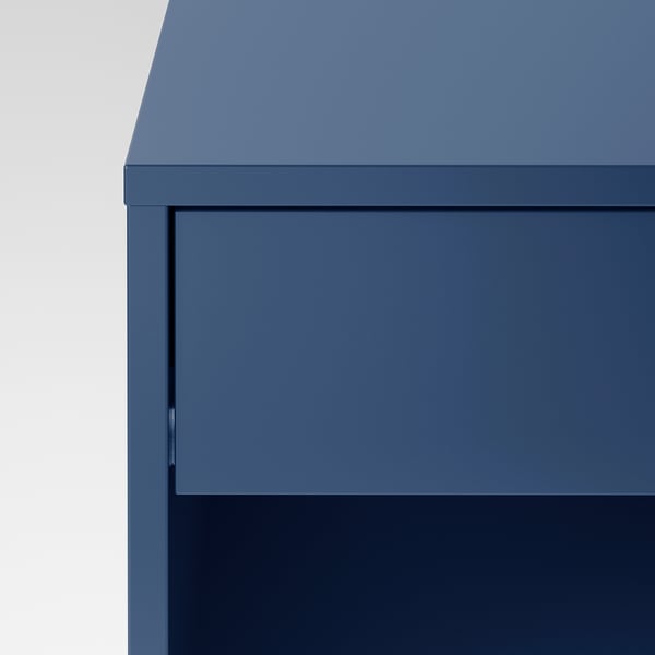 Close-up of blueIKEA bedside table drawer, smooth, modern, sturdy.