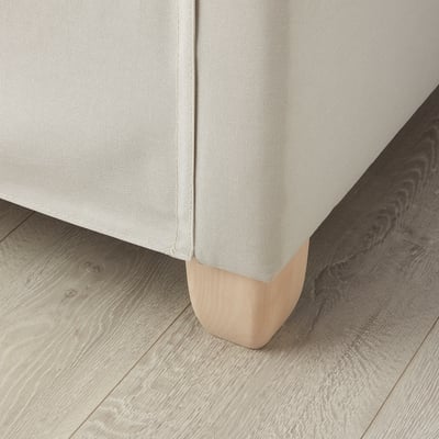 VINLIDEN chair leg, light wood, curved solid birch, clear lacquer, sturdy design, small corner view.