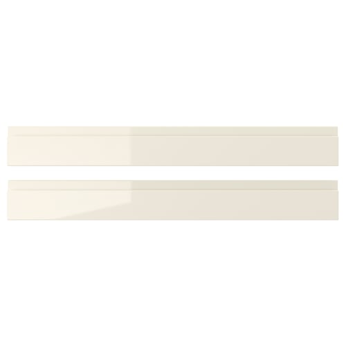Two sleek, beige, high-gloss VOXTORP drawer fronts, made from fibreboard and melamine laminate, neatly aligned horizontally.