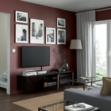 BESTÅ Banc TV avec portes, brun noir Hedeviken/brun foncé plaqué chêne, 180x42x38 cm