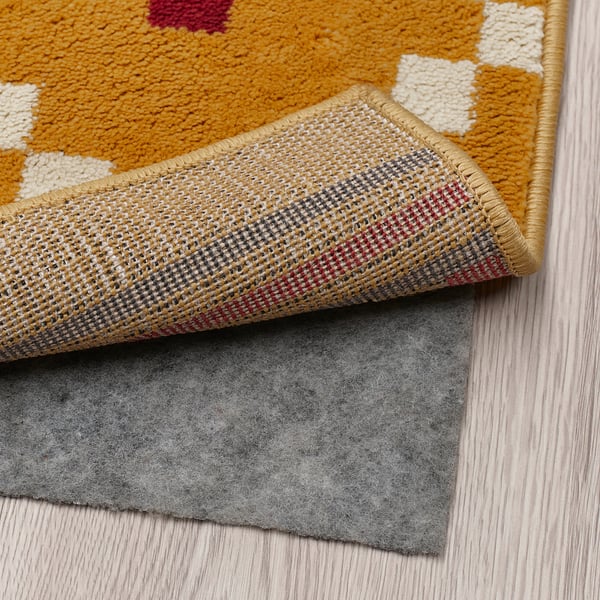 SKOTERLED Tapis, poils ras, jaune foncé/gris foncé, 133x195 cm