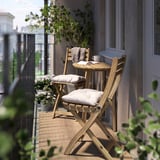 ASKHOLMEN Table f wall+2 fold chairs, outdoor, acacia/Kuddarna light grey-beige, 70x44 cm