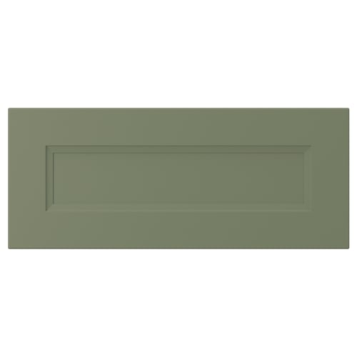 A green, rectangular kitchen cabinet door with an inset panel design. It is styled in a traditional manner with a smooth surface.