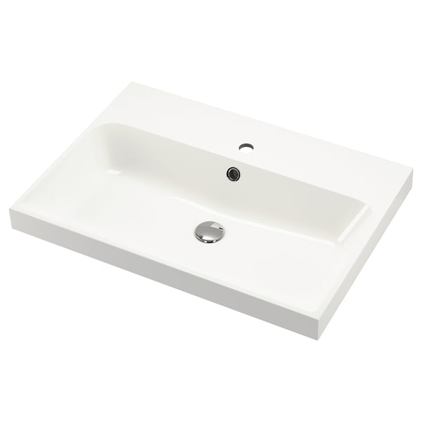 Modern white BACKSJÖN marble washbasin with drain cover.