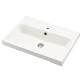 Modern white BACKSJÖN marble washbasin with drain cover.