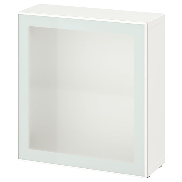 A white BESTÅ cabinet with frosted glass doors.