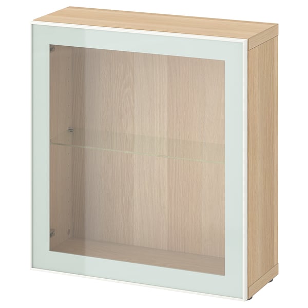 BESTÅ light wooden storage unit, square-shaped with glass door and shelf.