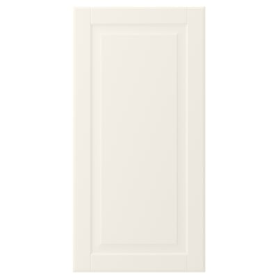 A BODBYN cabinet door in off-white. It bevelled panels and a smooth, lacquered surface.